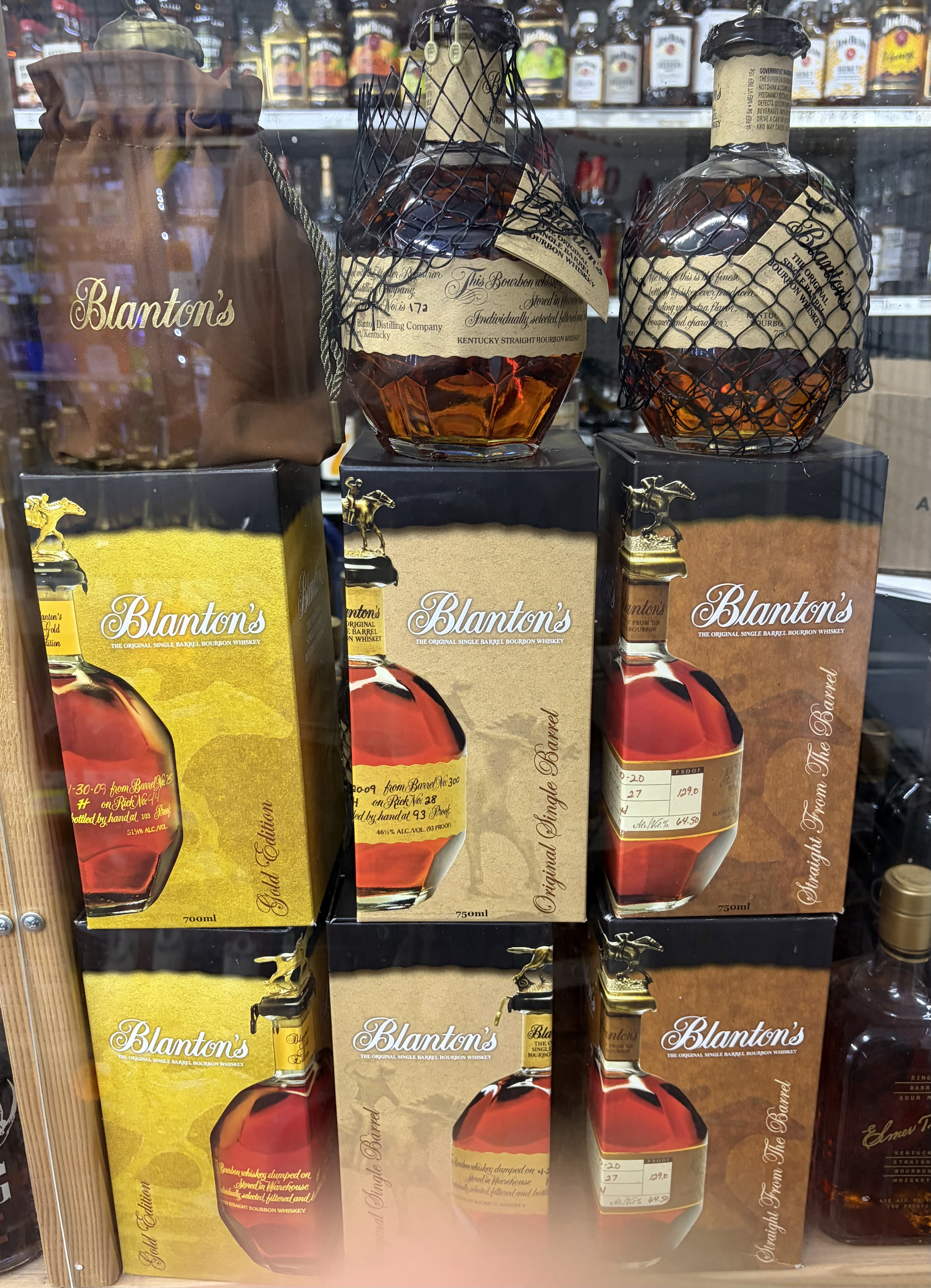 Several Blanton's editions displayed: Gold Edition, Original Single Barrel and Straight From The Barrel.