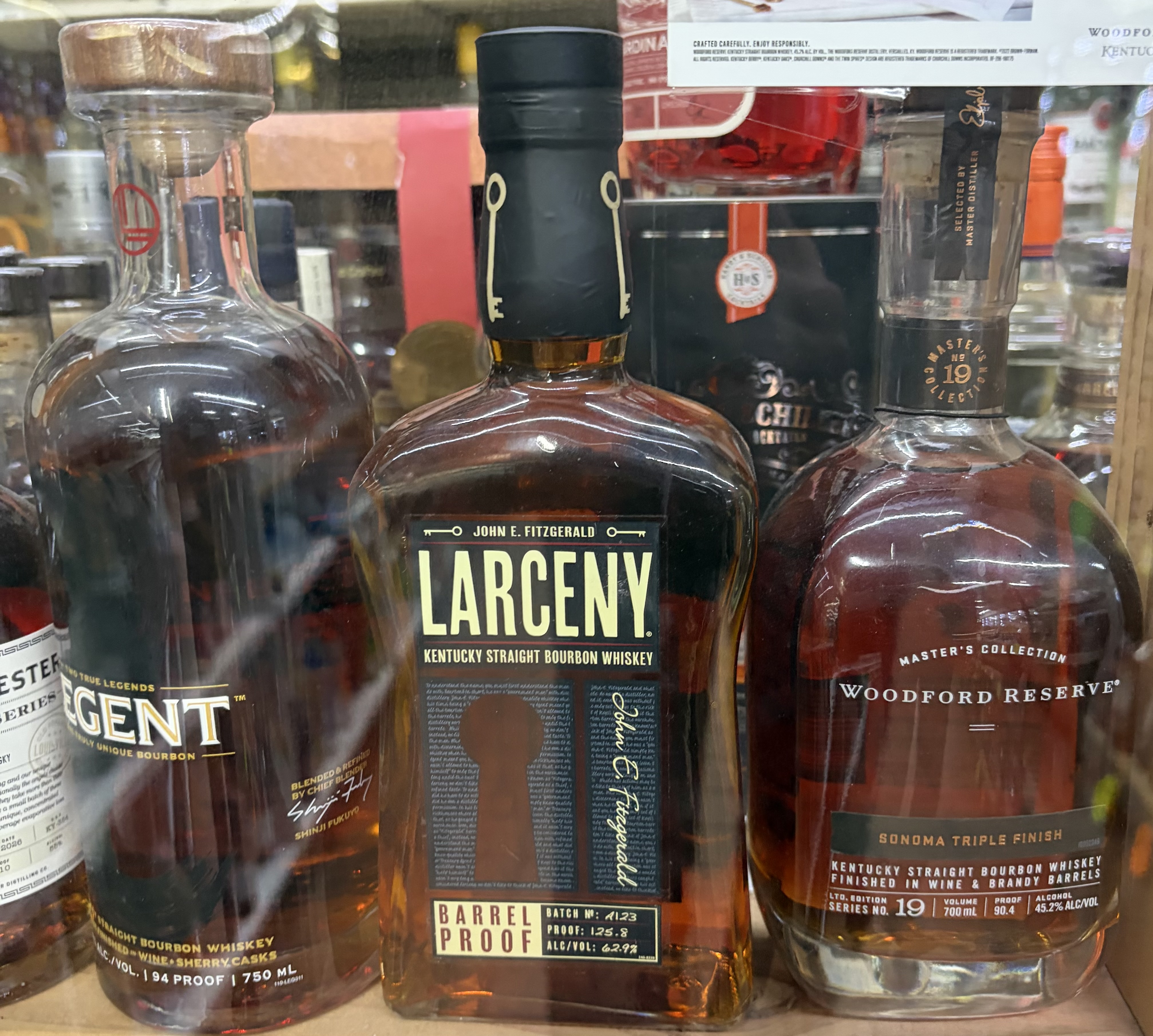 Bottles of Legent, Larceny Barrel Proof and Woodford Reserve Master's Collection Sonoma Triple Finish.