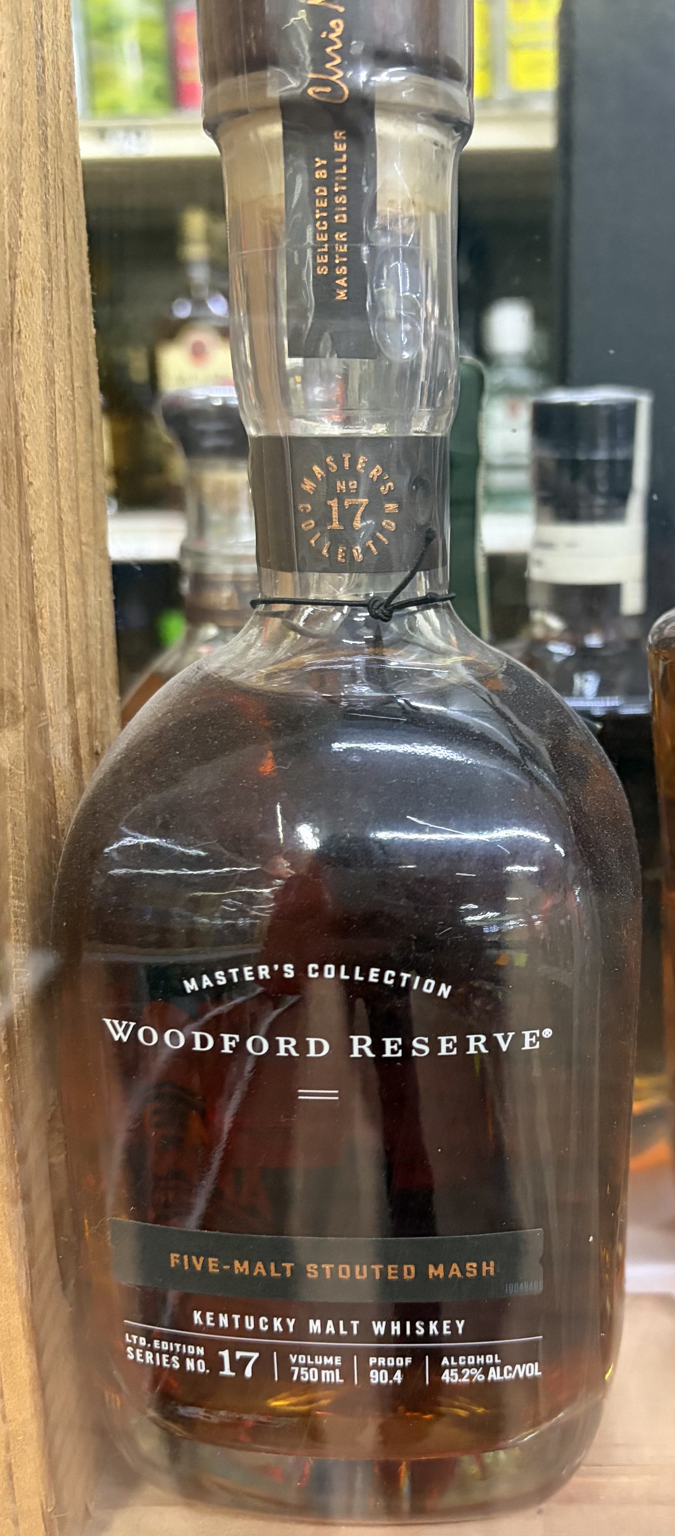 Woodford Reserve Master's Collection Series 17 Five-Malt Stouted Mash bottle in its wood case.