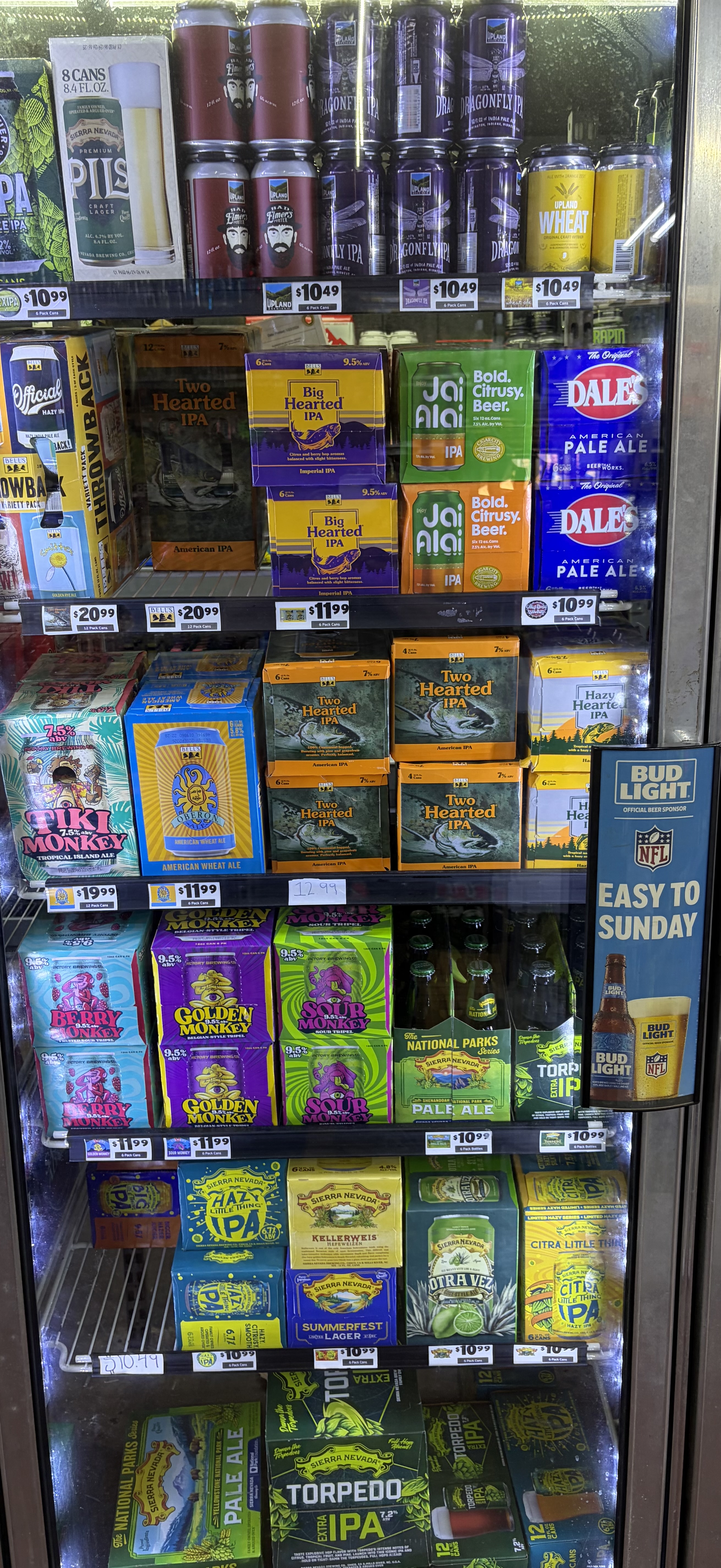 Craft beer six-packs including Bell's Two Hearted, Oberon, Jai Alai and Dale's Pale Ale.