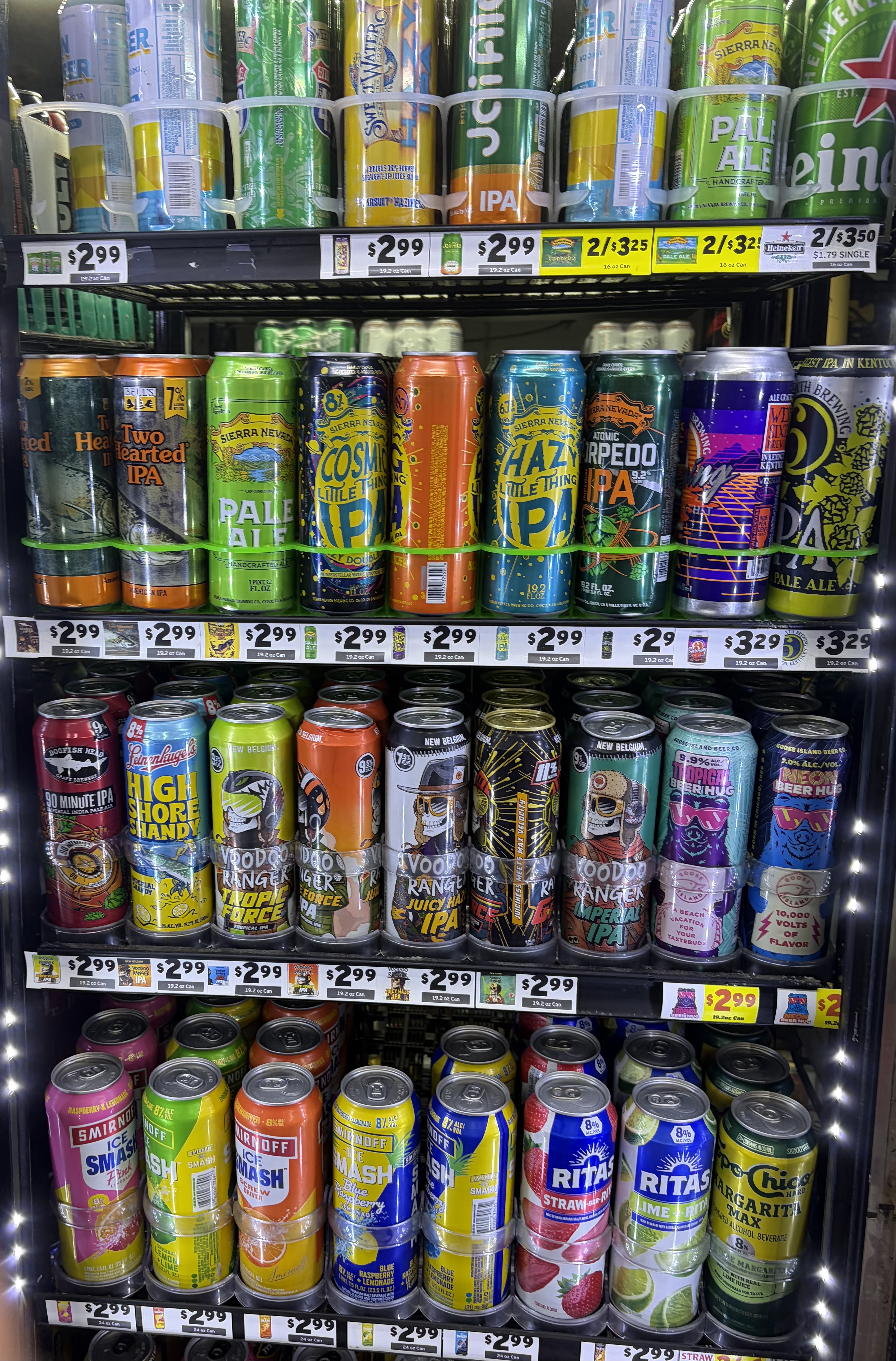 Craft tall-boy cans including Sierra Nevada Hazy Little Thing, Bell's Two Hearted and Voodoo Ranger.